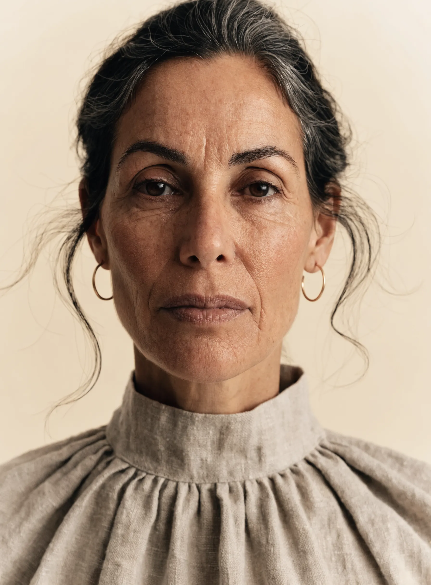 A woman’s skin before, showing natural fine lines and uneven tone